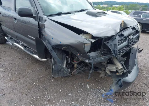 2011 Toyota Tacoma Base V6 z USA, uszkodzony, nr VIN 5TFLU4EN2BX010682